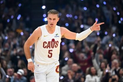 Cleveland Cavaliers guard #5 Sam Merrill celebrates during the first quarter against the Milwaukee Bucks at Rocket Arena.