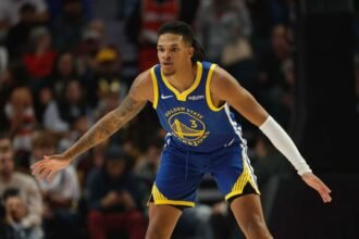 Golden State Warriors #3 Will Richard plays defense during the first quarter of a preseason game against the Portland Trail Blazers at Moda Center on October 14, 2025 in Portland, Oregon.