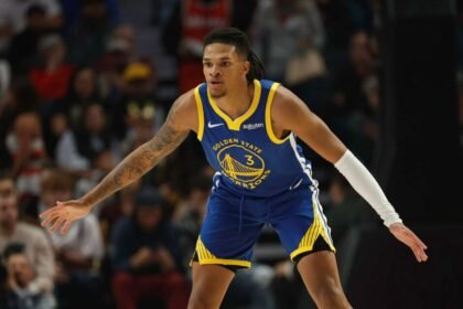 Golden State Warriors #3 Will Richard plays defense during the first quarter of a preseason game against the Portland Trail Blazers at Moda Center on October 14, 2025 in Portland, Oregon.