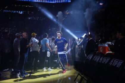 Golden State Warriors #2 Brandin Podzemski runs onto the court for a game against the Denver Nuggets at Chase Center on October 23, 2025 in San Francisco, California.