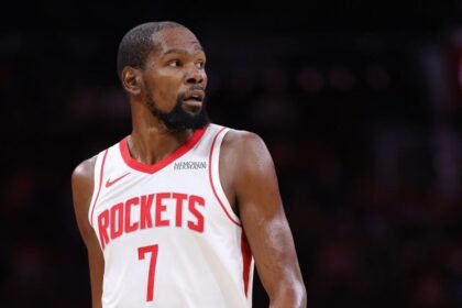 Houston Rockets No. 7 Kevin Durant watches the first half of the preseason game against the Utah Jazz at Toyota Center.