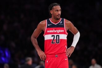 Washington Wizards #20 Alex Sarr watches during the third quarter of the game against the New York Knicks at Madison Square Garden.