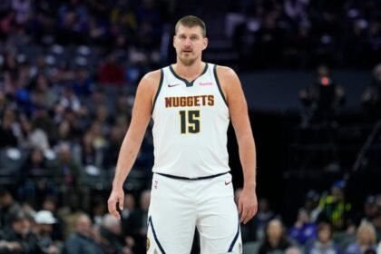 #15 Nikola Jokic of the Denver Nuggets takes on the Sacramento Kings during the second half of an NBA basketball game at Golden 1 Center.