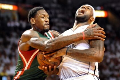 LeBron James (right) of the Miami Heat is fouled by Larry Sanders of the Milwaukee Bucks in the first quarter of Game 2 of the opening round of the NBA Playoffs at AmericanAirlines Arena in Miami.
