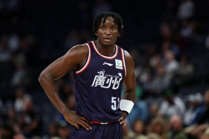 Victor Oladipo plays for the Guangzhou Long Lions against the Minnesota Timberwolves during the 2025-26 preseason.
