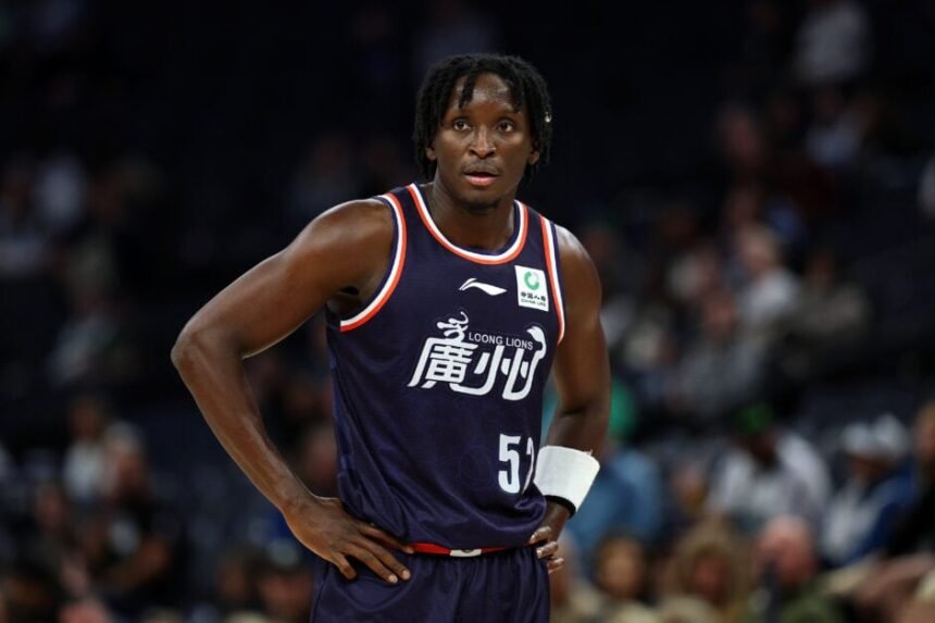 Victor Oladipo plays for the Guangzhou Long Lions against the Minnesota Timberwolves during the 2025-26 preseason.
