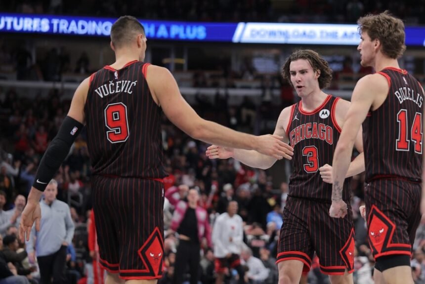 Chicago Bulls #3 Josh Guidi reacts to Chicago Bulls basket #9 Nikola Vucevic during the second half of the Emirates NBA Cup.